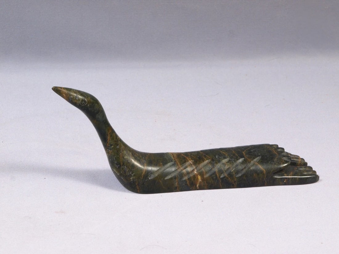Inuit Eskimo Native Canada Soapstone Carving Goose Duck Signed Cape Dorset '94: This is a vintage Primitive Native American Eskimo Figurine. The figurine is made from stone and it is very beautiful. Ii is a figure of a goose or duck. It is signed at the bottom with sylables and