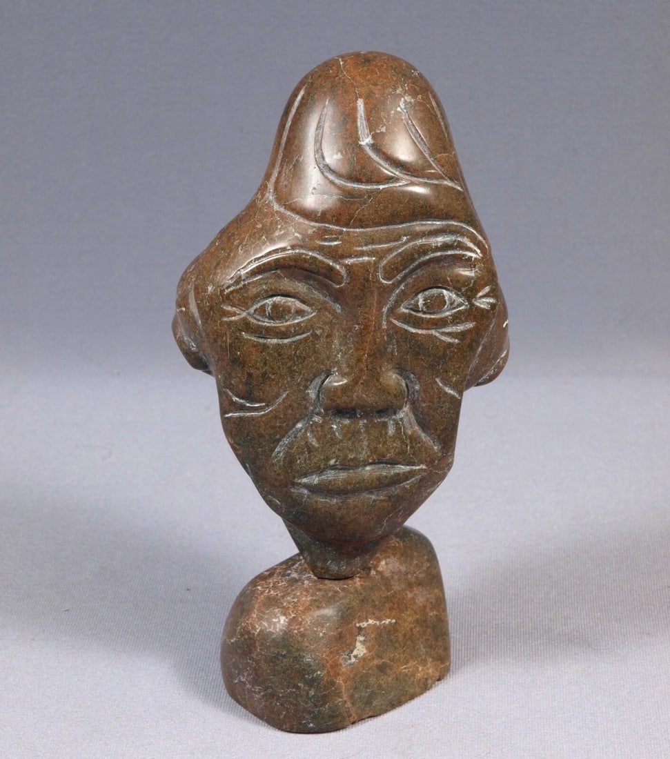 Native American Stone Carving Faces SIGNED Canada Rare Brown: This is a vintage Primitive Native American Figurine. It is signed on the bottomIt is rare and very beautiful. It shows a man face on one side, a woman face on the opposite side and animal face on