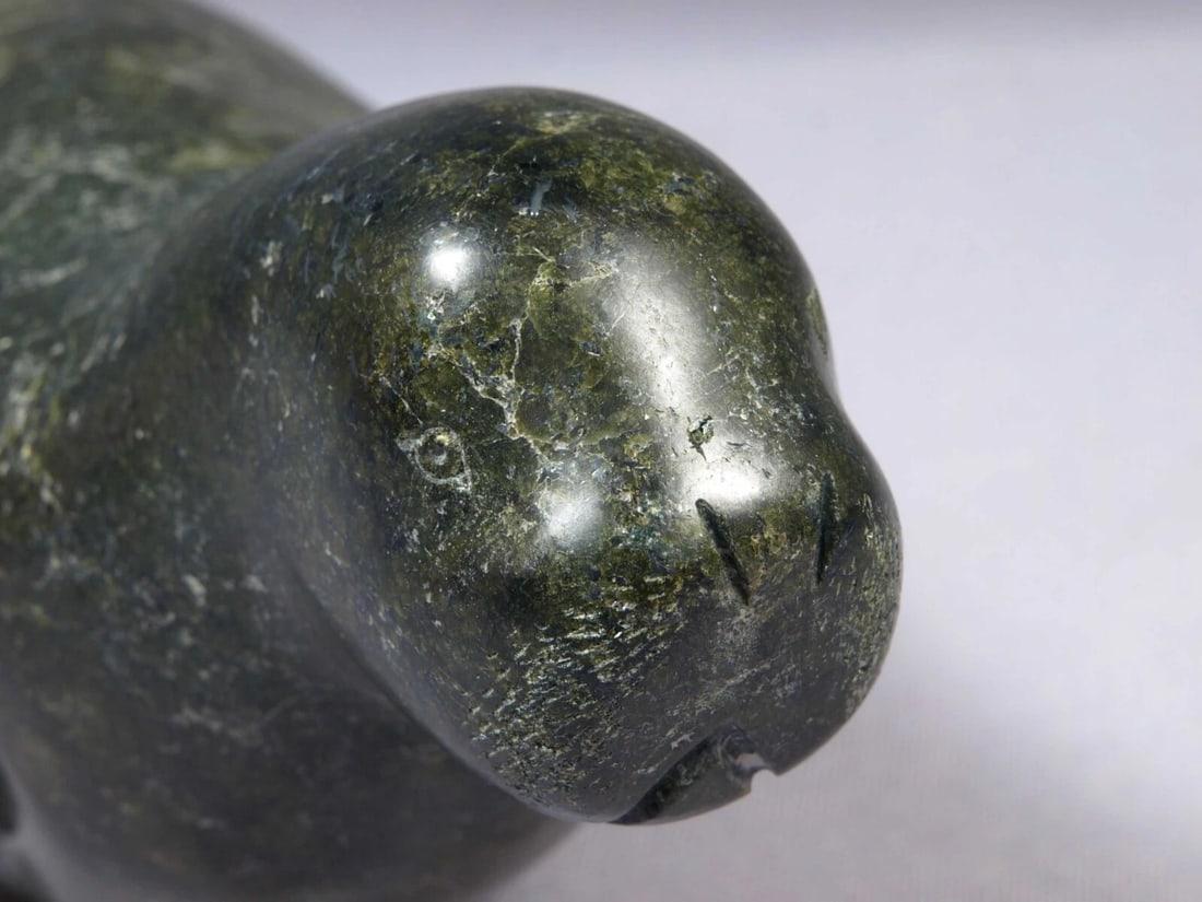 Soapstone Inuit Native American Canada Figurine Seal Signed Johnny Temela: This is a vintage, Native American Canadian Inuit Figurine. It is signed at the bottom. It was made in 1999 by Johnny Temela. The figurine is made from black soapstone and is very beautiful. The
