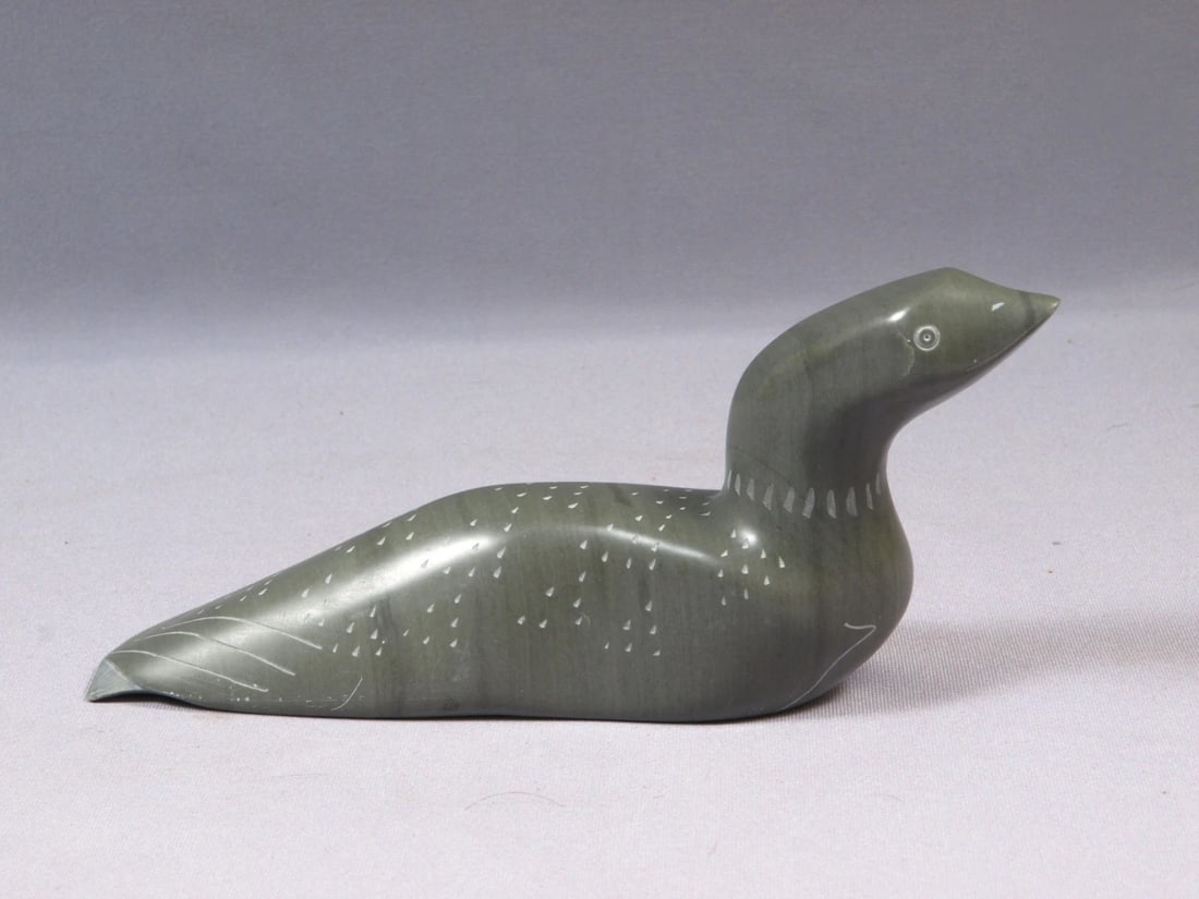 Inuit Eskimo Native Canada Soapstone Carving Goose Duck: This is a vintage Primitive Native American Eskimo Figurine. The figurine is made from stone and it is very beautiful. Ii is a figure of a goose or duck. The carving is app. 9" long and 4"tallIt is