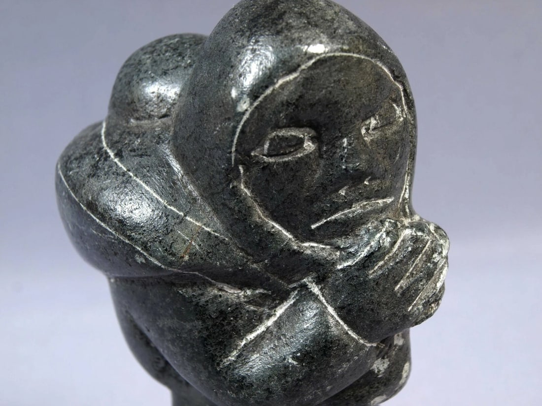 Signed Inuit Native American Soapstone Mom Mother baby Canada VINTAGE 1982: This is a vintage Primitive Native American Eskimo Inuit Figurine. It is signed at the bottom with syllables and 1982. The figurine is made from black soapstone and is very beautiful. The figurine