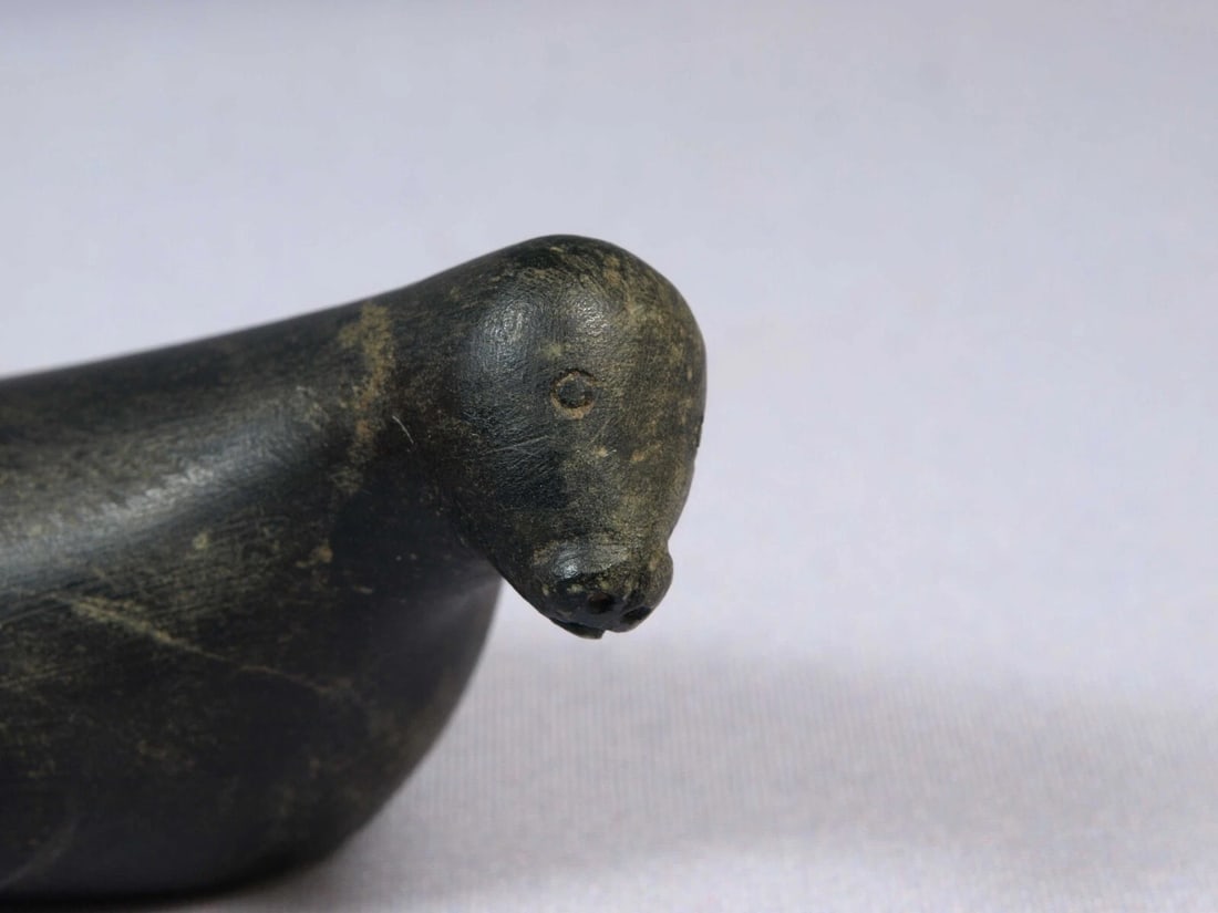 Soapstone Inuit Native American Canada Figurine Black Seal Signed Vintage: This is a vintage, Native American Canadian Inuit Figurine. It is signed at the bottom with numbers and some syllables. The figurine is made from black soapstone and is very beautiful. The figurine