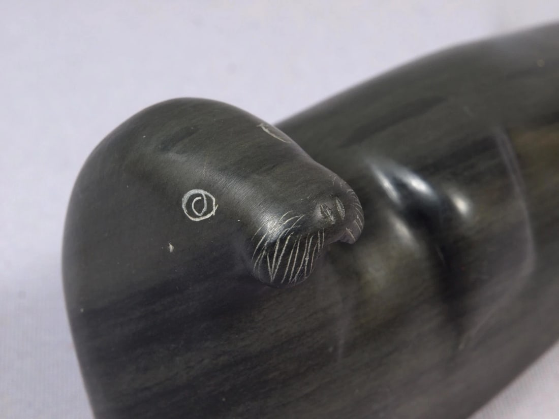 Soapstone Inuit Native Canada Figurine Black Seal Vintage Sticker Signed: This is a vintage, Native American Canadian Inuit Figurine. It looks it is is signed at the bottom. It has the vintage Canada Eskimo Art Sticker. The figurine is made from black soapstone and is very