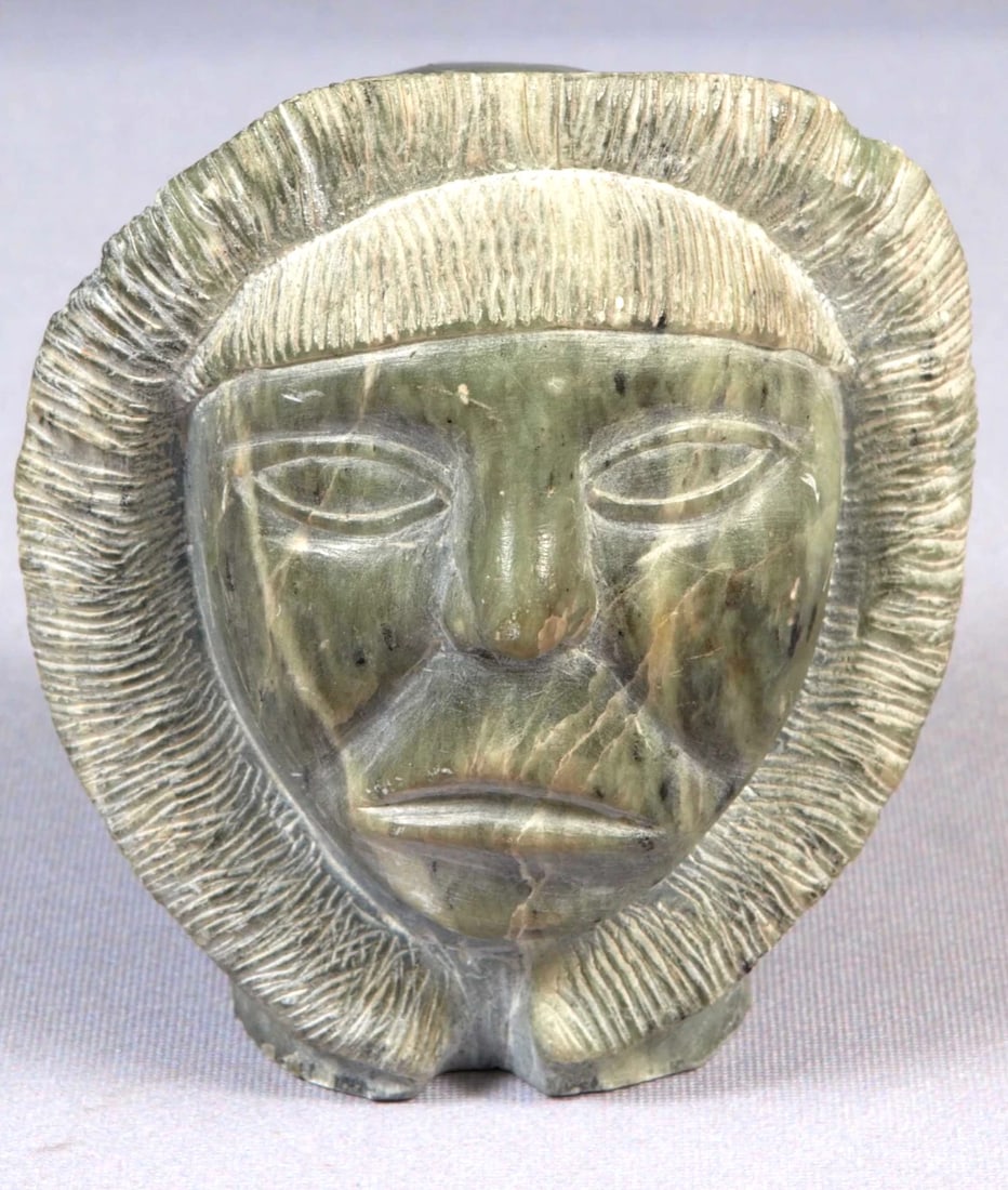 Inuit Native American Soapstone Carving Face SIGNED Gray Green: This is a vintage Primitive Native American Inuit Figurine. It shows a face of native person.The figurine is made from gray/greenish soapstone and is very beautiful. It is signed at the bottom. The
