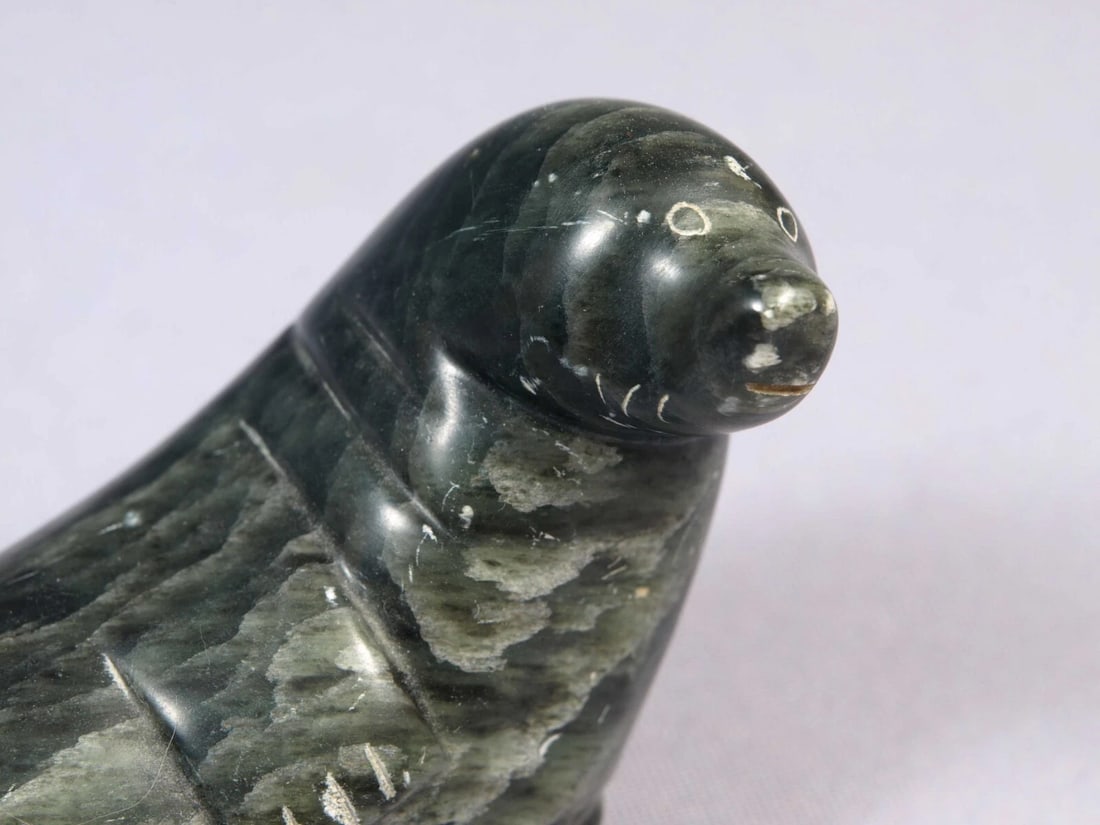 Soapstone Inuit Native Canada Figurine Black Seal Signed Vintage 1983: This is a vintage, Native American Canadian Inuit Figurine. It is signed at the bottom. It looks it was made in 1983 by Aeib. The figurine is made from black soapstone and is very beautiful. The