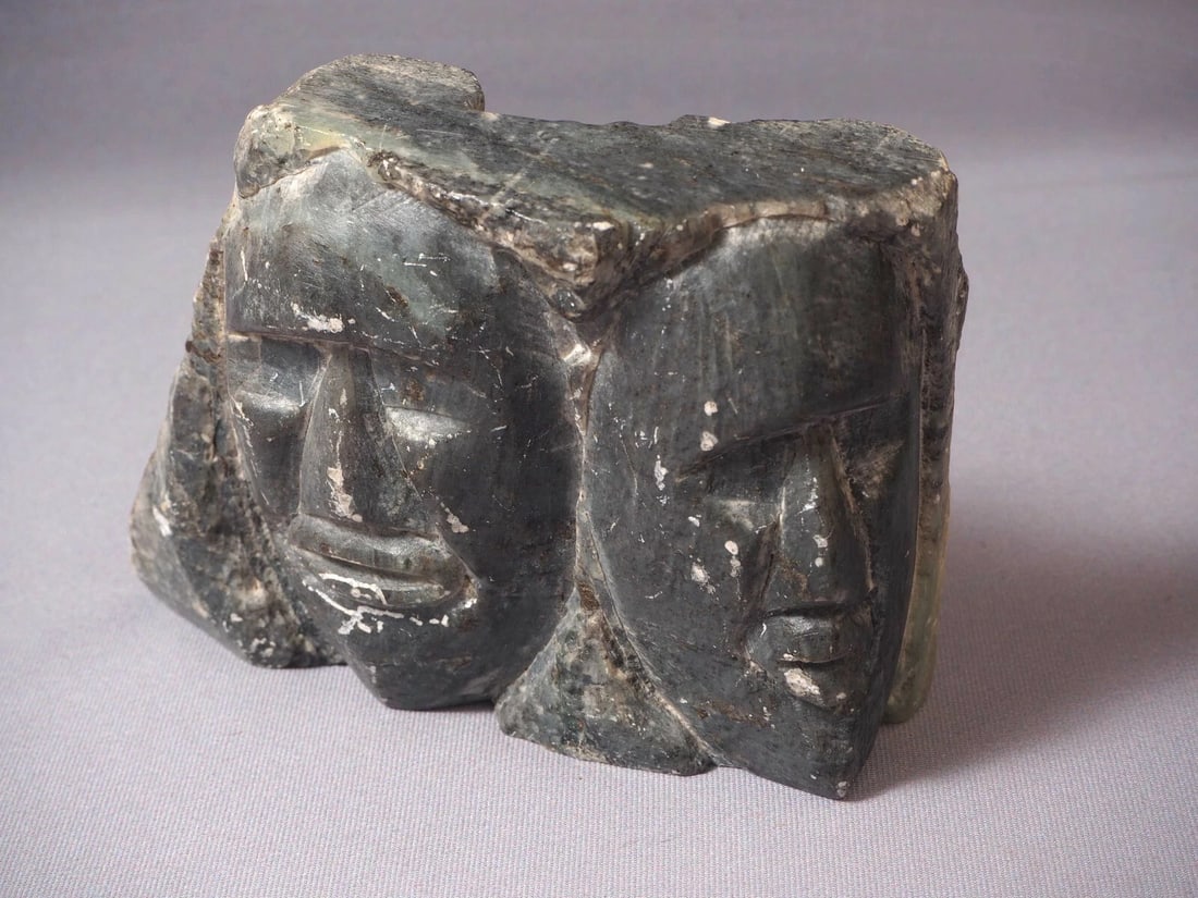 Native American Stone Carving Faces SIGNED Canada Green Gray: This is a vintage Primitive Native American Figurine. It shows a face at one side and two faces on the other side. The sculpture shows the connection between people It is signed on the bottom. I've se