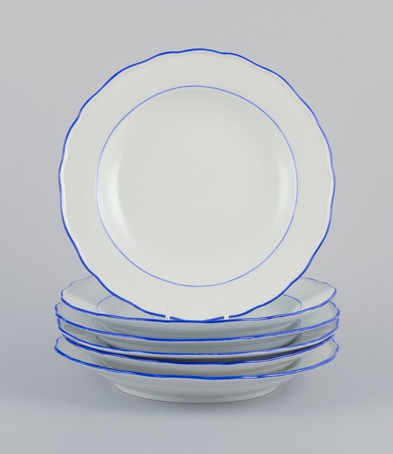 Meissen, Germany. A set of six dinner plates. White porcelain with blue rim. Early 20th century.: Meissen, Germany. A set of six dinner plates. White porcelain with blue rim. Early 20th century. Marked. Third factory quality. In excellent condition with minor signs of wear. Dimensions: D 24.0 cm x