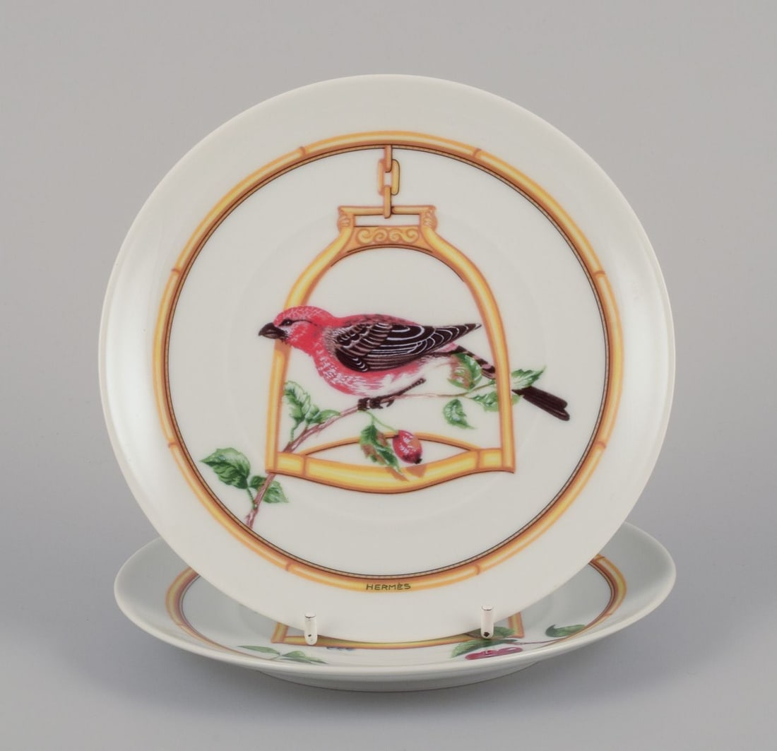 Hermès, France. Two porcelain plates with bird motifs. "L'Étrier Perchoir" series. Late (1 of 8)
