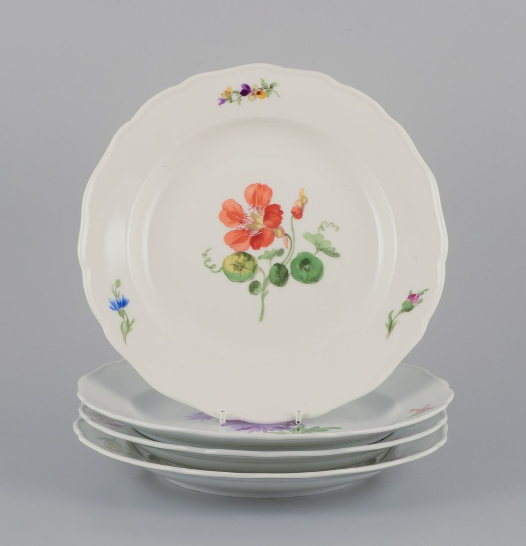 Meissen, Germany. A set of four porcelain dinner plates with floral motifs. Approx. from 1900. (1 of 10)