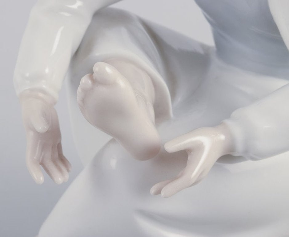 NAO, Spain. Porcelain figurine of a girl having a rest. Circa 1980s. - 6
