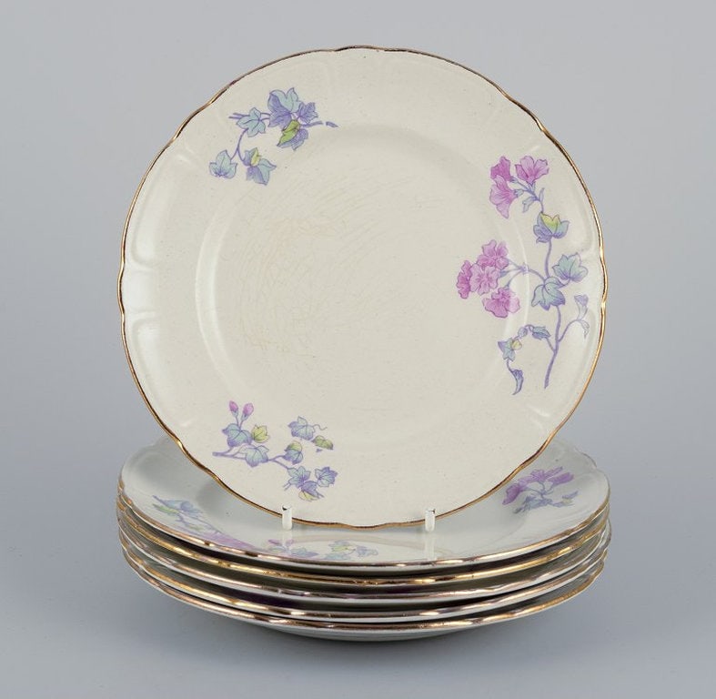 Gustafsberg, Sweden. A set of six flat 'Geranium' earthenware plates. 1918. (1 of 6)