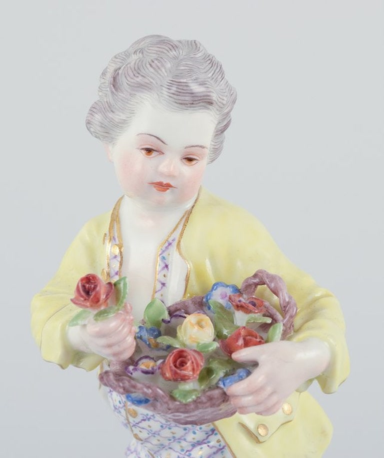Meissen, Germany. Porcelain figurine of boy with basket of flowers. Ca. 1900. - 3