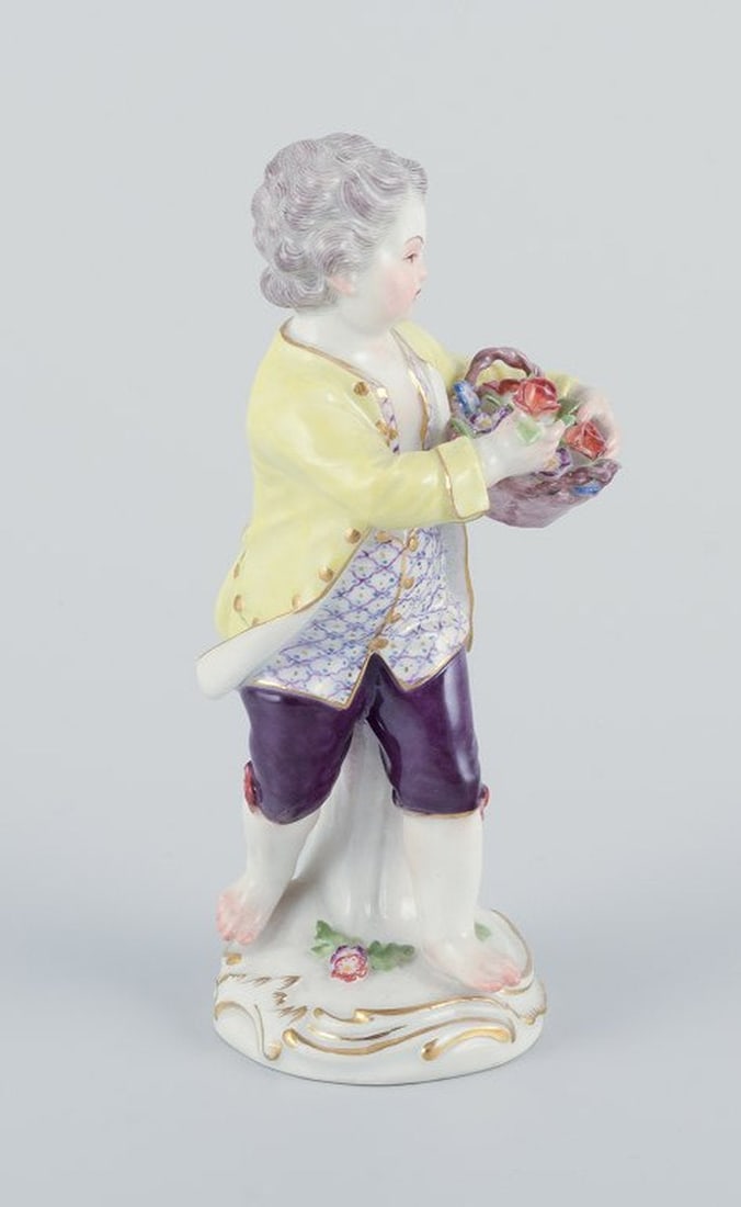 Meissen, Germany. Porcelain figurine of boy with basket of flowers. Ca. 1900. - 6