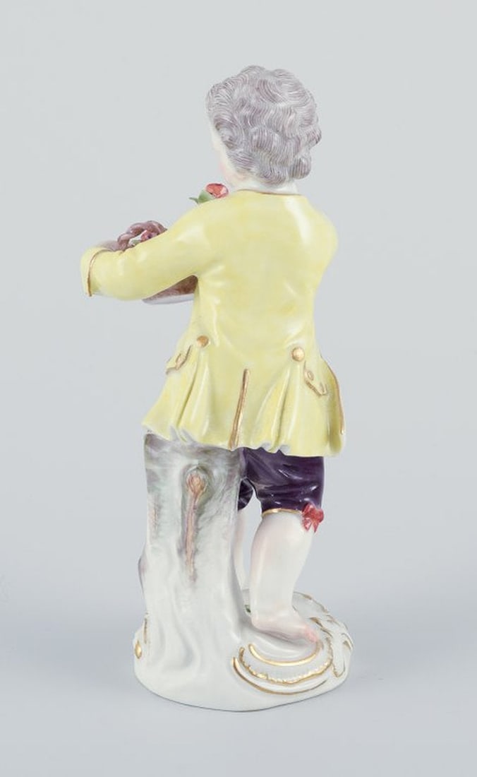 Meissen, Germany. Porcelain figurine of boy with basket of flowers. Ca. 1900. - 7