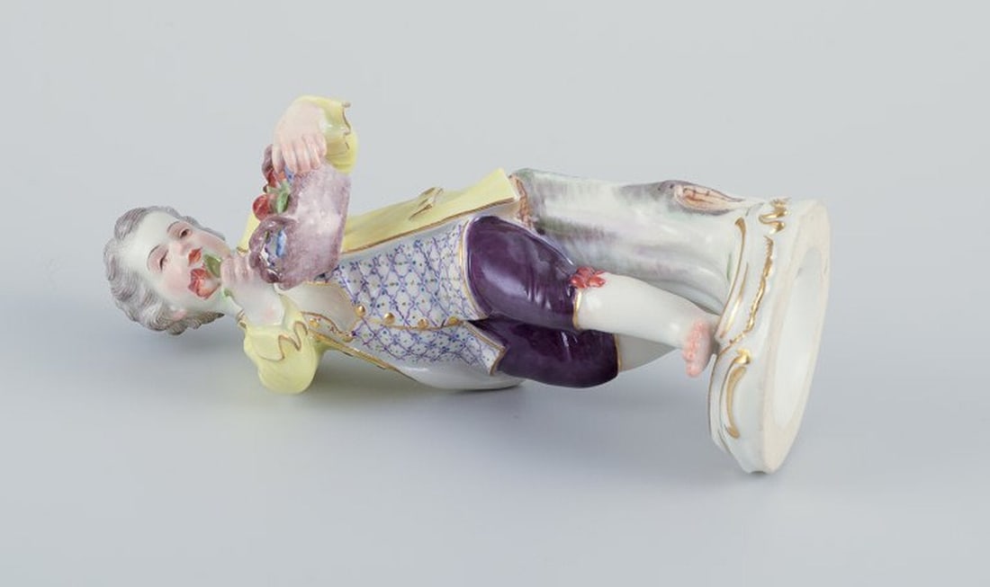 Meissen, Germany. Porcelain figurine of boy with basket of flowers. Ca. 1900. - 8