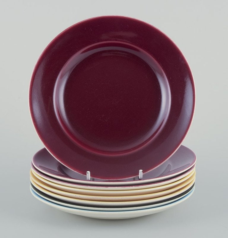 Aluminia, Denmark. Eight 'Confetti' plates in glazed earthenware. Different colours. Mid 20th - 2