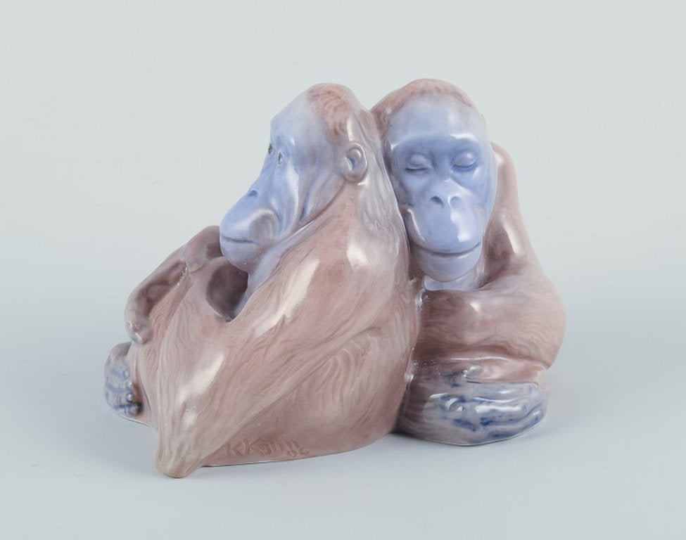Knud Kyhn for Royal Copenhagen. Rare porcelain figurine of two orangutans. Dated early 1900s. - 2