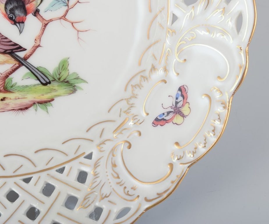 Meissen, Germany. Open lace porcelain plate. Hand-painted with a bird motif and insects, gold trim. - 6