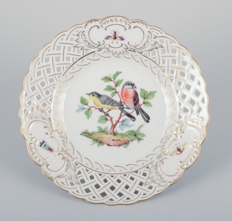 Meissen, Germany. Open lace porcelain plate. Hand-painted with a bird motif and insects, gold trim. (1 of 7)
