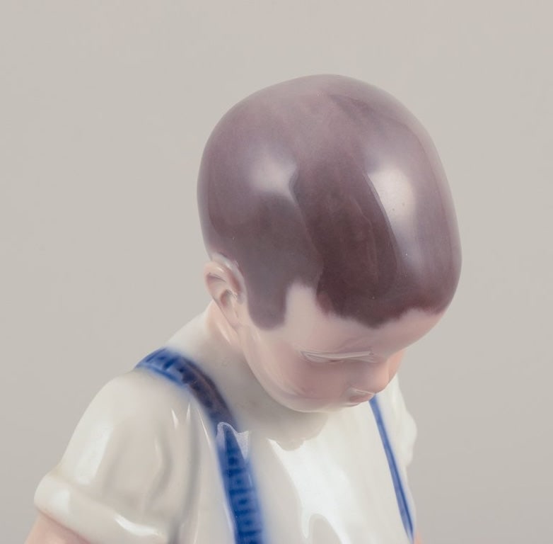 Bing & Grøndahl, Denmark. Porcelain figurine of a boy and crab. Mid-20th century. - 5