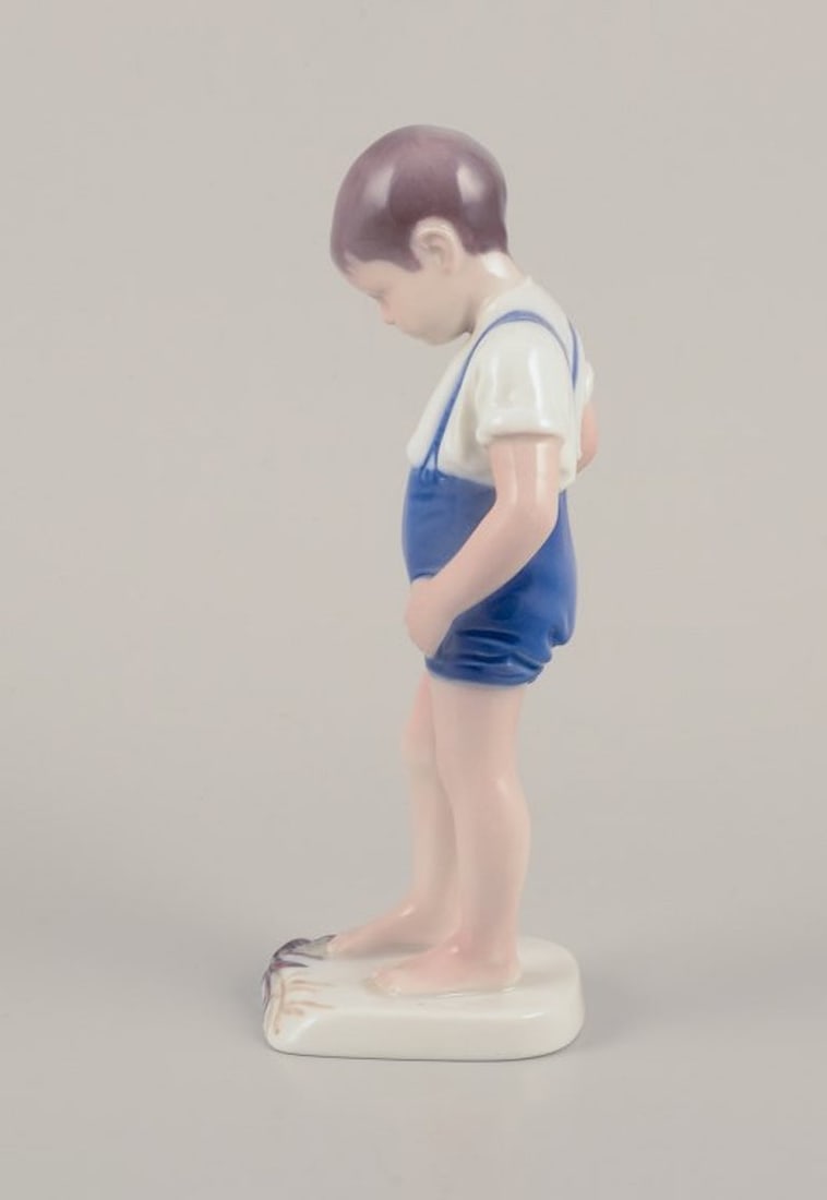 Bing & Grøndahl, Denmark. Porcelain figurine of a boy and crab. Mid-20th century. - 7