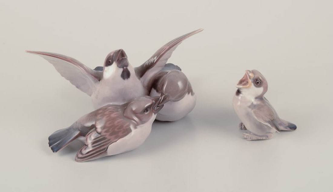 Bing & Grøndahl, Denmark. Two porcelain figurines consisting of a group of three sparrows and (1 of 9)