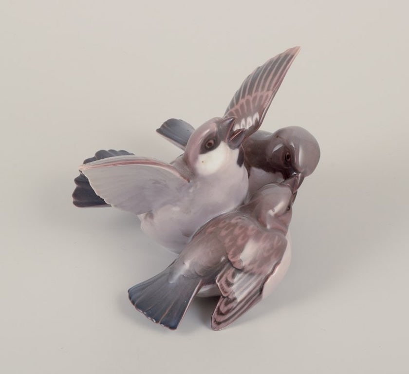 Bing & Grøndahl, Denmark. Two porcelain figurines consisting of a group of three sparrows and - 6