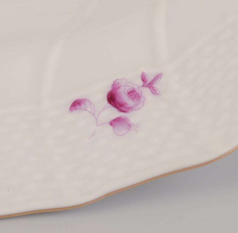 Herend, Hungary. A set of four deep porcelain plates with purple floral motifs. Mid-20th C. - 6