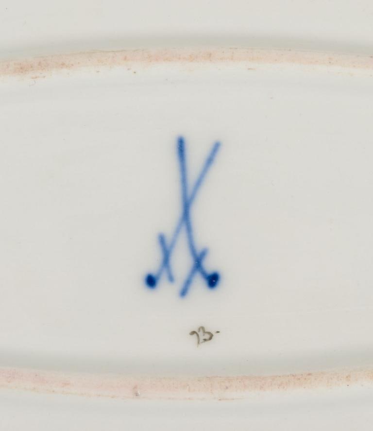 Meissen, Germany. Two oval serving platters in porcelain with polychrome floral motifs. Approx. from - 9