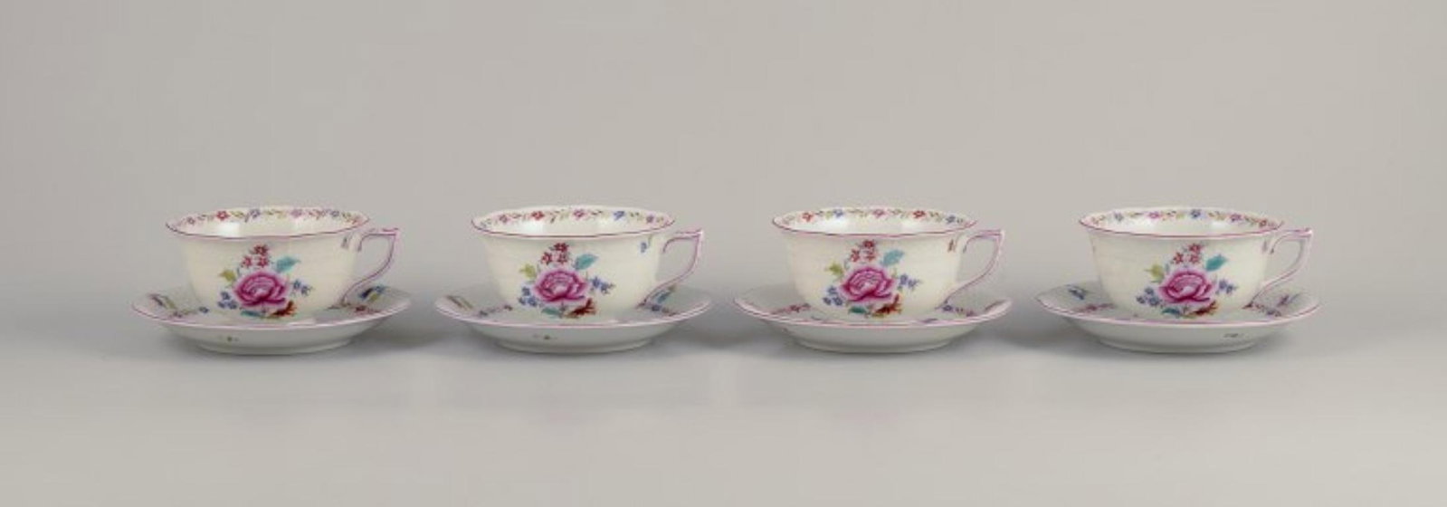 Herend, four pairs of large porcelain teacups & saucers with floral motifs. Dated 1944. - 2