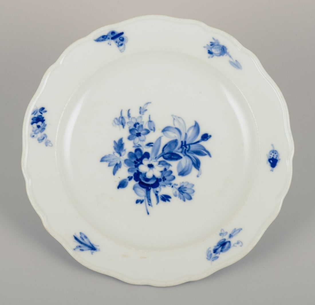 Meissen, Germany. Four porcelain lunch plates with floral motifs and insects in blue. Approx. - 5