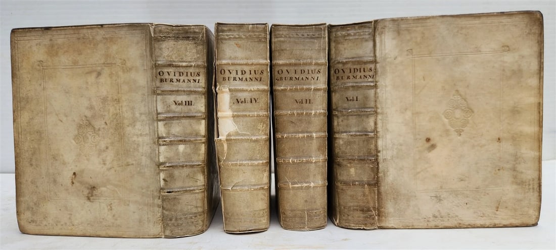 1727 OVID 4 VELLUM BOUND VOLUMES antique Publius Ovidius Naso: Ovidius, N.P. (Publius Ovidius Naso) Opera omnia... notis N. Heinsius... cura et studio P. Burmann. Amsterdam, Janssonius Waesberge; 1727 4 volumes With 3 engraved frontispieces. Original blind-stampe