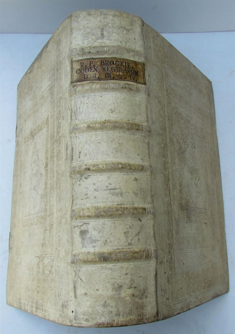 1759 PIGSKIN decorative BINDING ANTIQUE FOLIO Codex Regularum Lucae Holstenii V3: Codex Regularum, Lucae Holstenii, 1759 The Codex Regularum, created in Aachen in 817, was designed by Benedict to restore the strict observation of monastic life which had been relaxed over recent