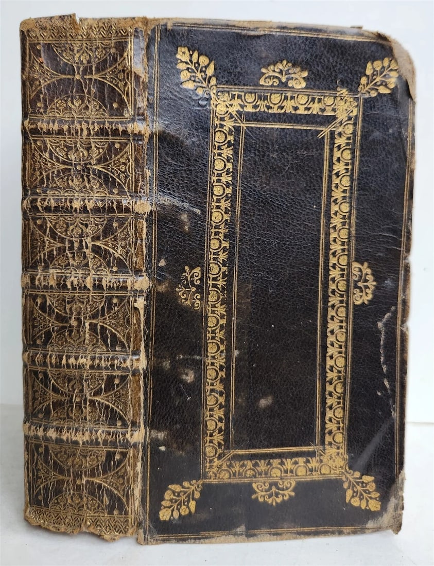 1695 BIBLE in ENGLISH OLD TESTAMENT Oxford: University printers antique: Holy Bible (Old Testament Only) Oxford: University printers; 1695 Original full leather with gilt decoration; rubbed , gilt edges Three leaves are with torn corners Size 3 1/2 by 6 1/4 inches Text in 