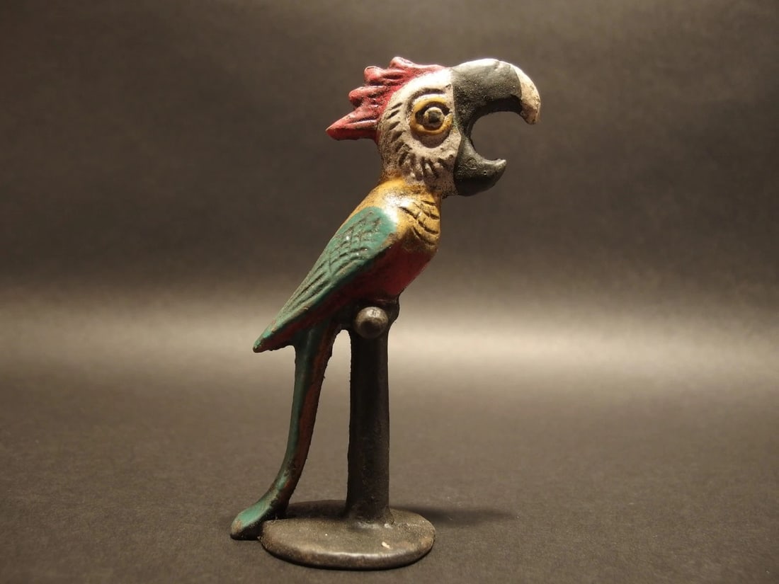 Cast Iron Parrot Beer Bottle Opener bar tool: 5 1/4" Tall Great reproduction cast iron bottle opener. This piece was made to look just like an antique, but is new. Great for use or display! Reserve: $20.00 Shipping: Domestic: Flat-rate of $8.00