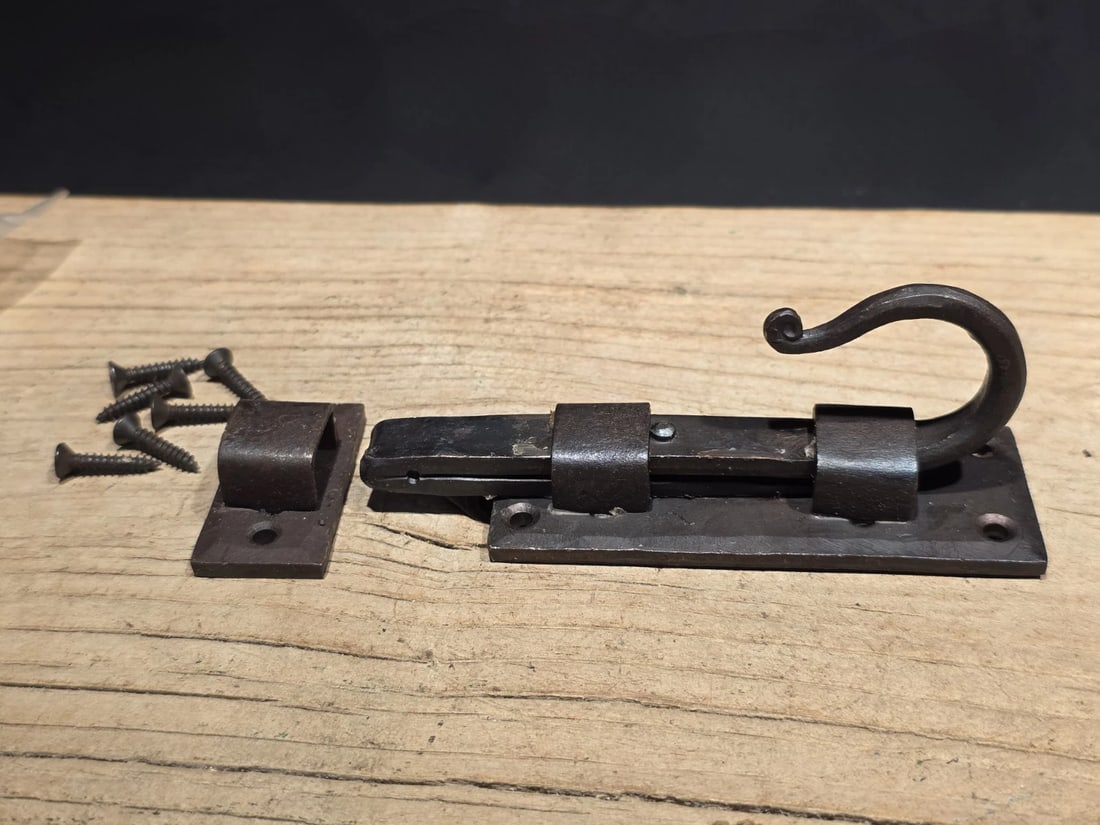 Hand Forged Wrought Iron Slide Latch Rustic Barrel Bolt: This heavy-duty slide latch is perfect for those seeking a primitive, colonial, or farmhouse aesthetic. Unlike mass-produced store-bought latches, this piece features unique hammer marks and a