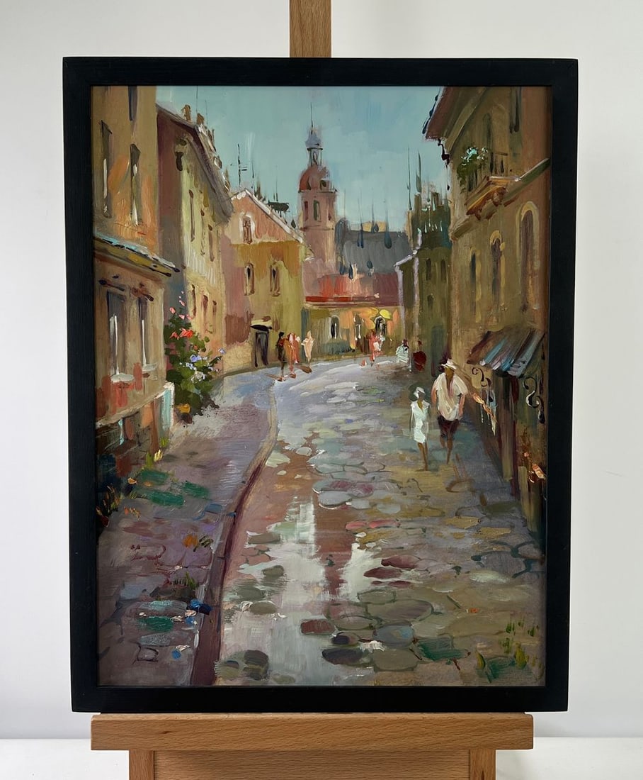 Oil painting Childhood alley Yuriy Suprunchuk: NoAAA5180The oil painting on Cardboard titled "Childhood Alley" captures the poetic charm of a sunlit European street through the lens of nostalgia and tenderness. At first glance, the viewer is