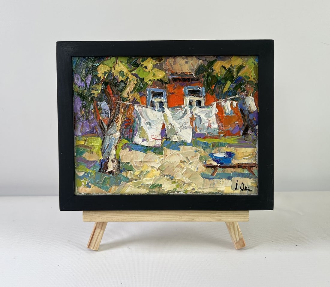Oil painting Clothes are drying Oksana Kalenyuk: NoAAA5213The oil painting on Canvas titled "Clothes are Drying" is a vivid and expressive portrayal of a familiar rural scene, captured with warmth, texture, and a deep appreciation for the everyday