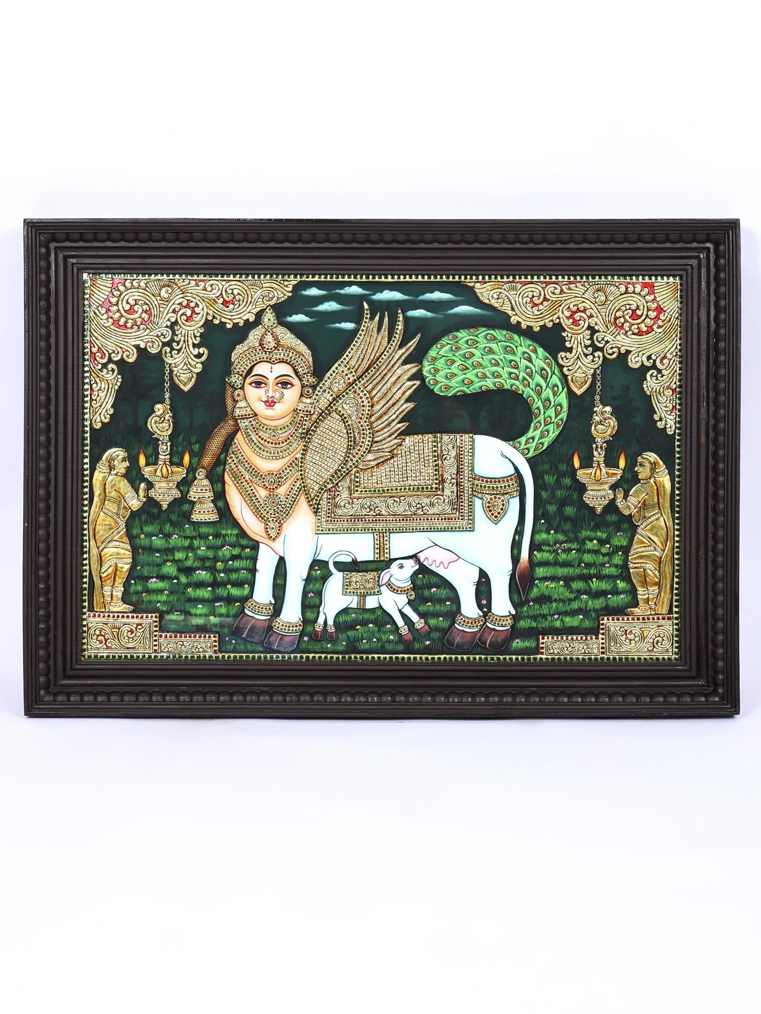 Goddess Kamadhenu with Calf | 24 Karat Gold Work | Framed Tanjore Painting: Title: Goddess Kamadhenu with Calf | 24 Karat Gold Work | Framed Tanjore Painting Description: Tanjore (Thanjavur) Painting Reserve: $2,132.00 Shipping: Domestic: Shipping rates are determined by