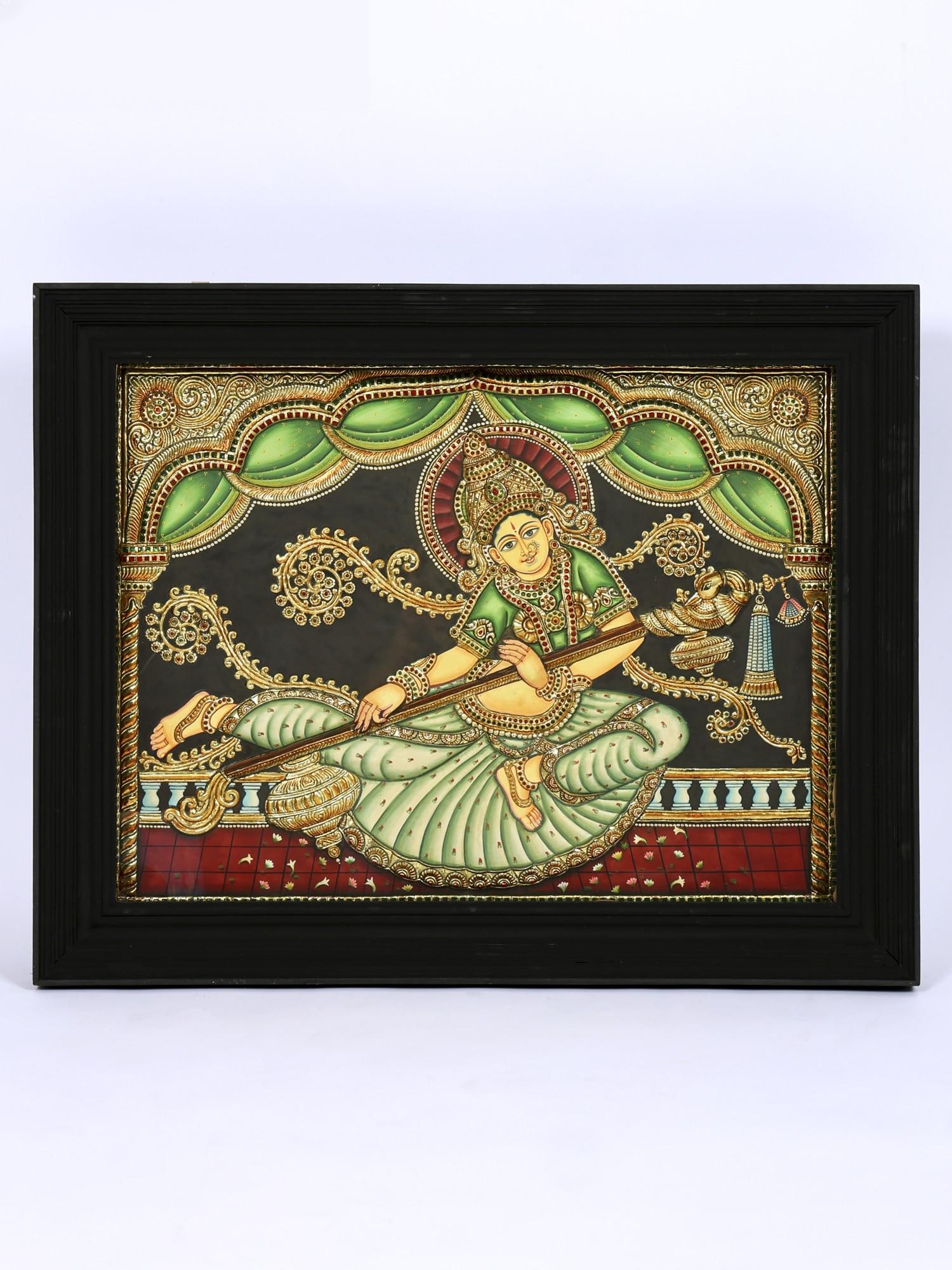 Indonesian Saraswati | 24 Karat Gold Work | Framed Tanjore Painting: Title: Indonesian Saraswati | 24 Karat Gold Work | Framed Tanjore Painting Description: Tanjore (Thanjavur) Painting Reserve: $1,733.00 Shipping: Domestic: Shipping rates are determined by destination