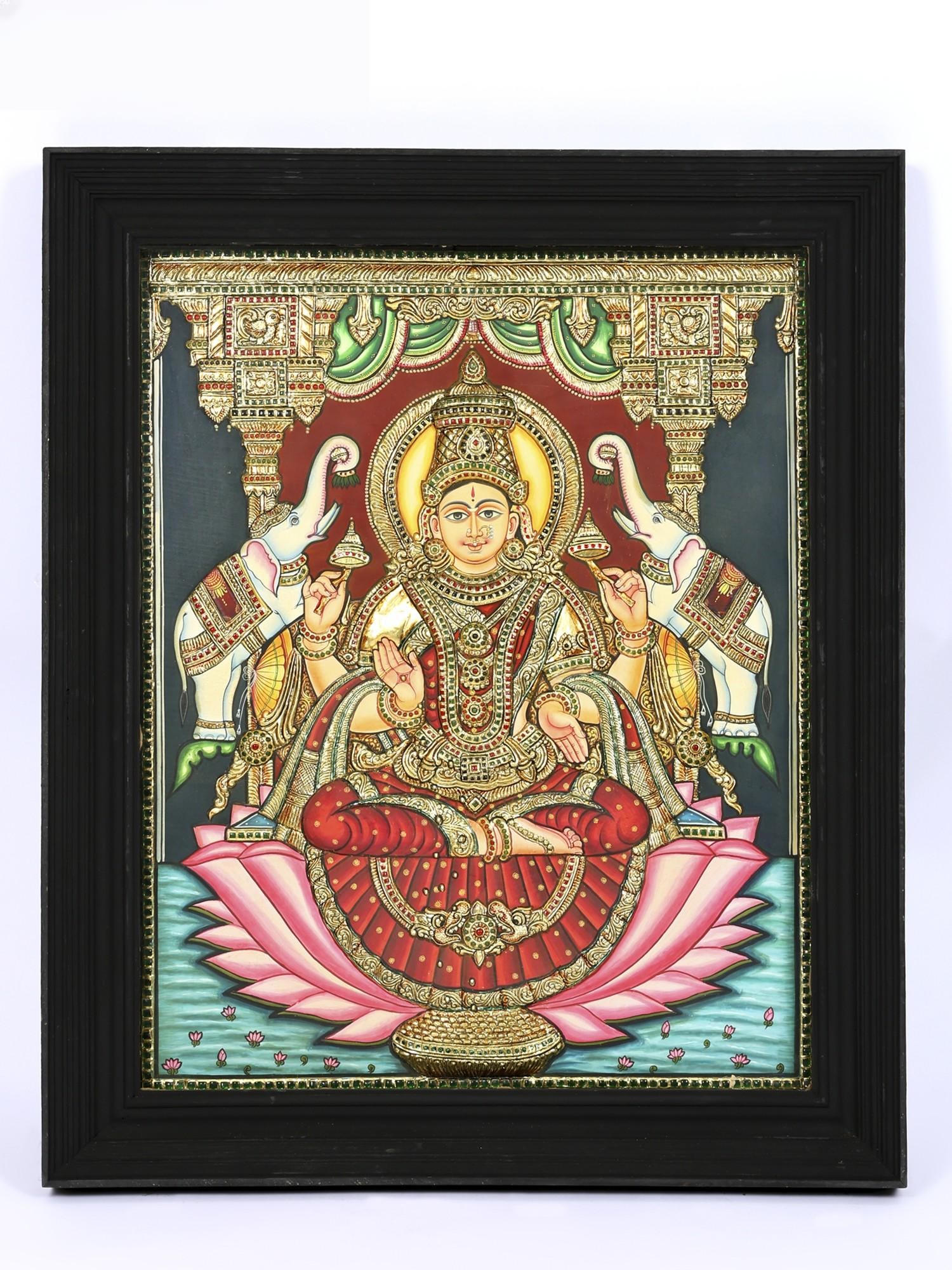 Goddess Gajalakshmi | 24 Karat Gold Work | Framed Tanjore Painting: Title: Goddess Gajalakshmi | 24 Karat Gold Work | Framed Tanjore Painting Description: Tanjore (Thanjavur) Painting Reserve: $1,733.00 Shipping: Domestic: Shipping rates are determined by destination 