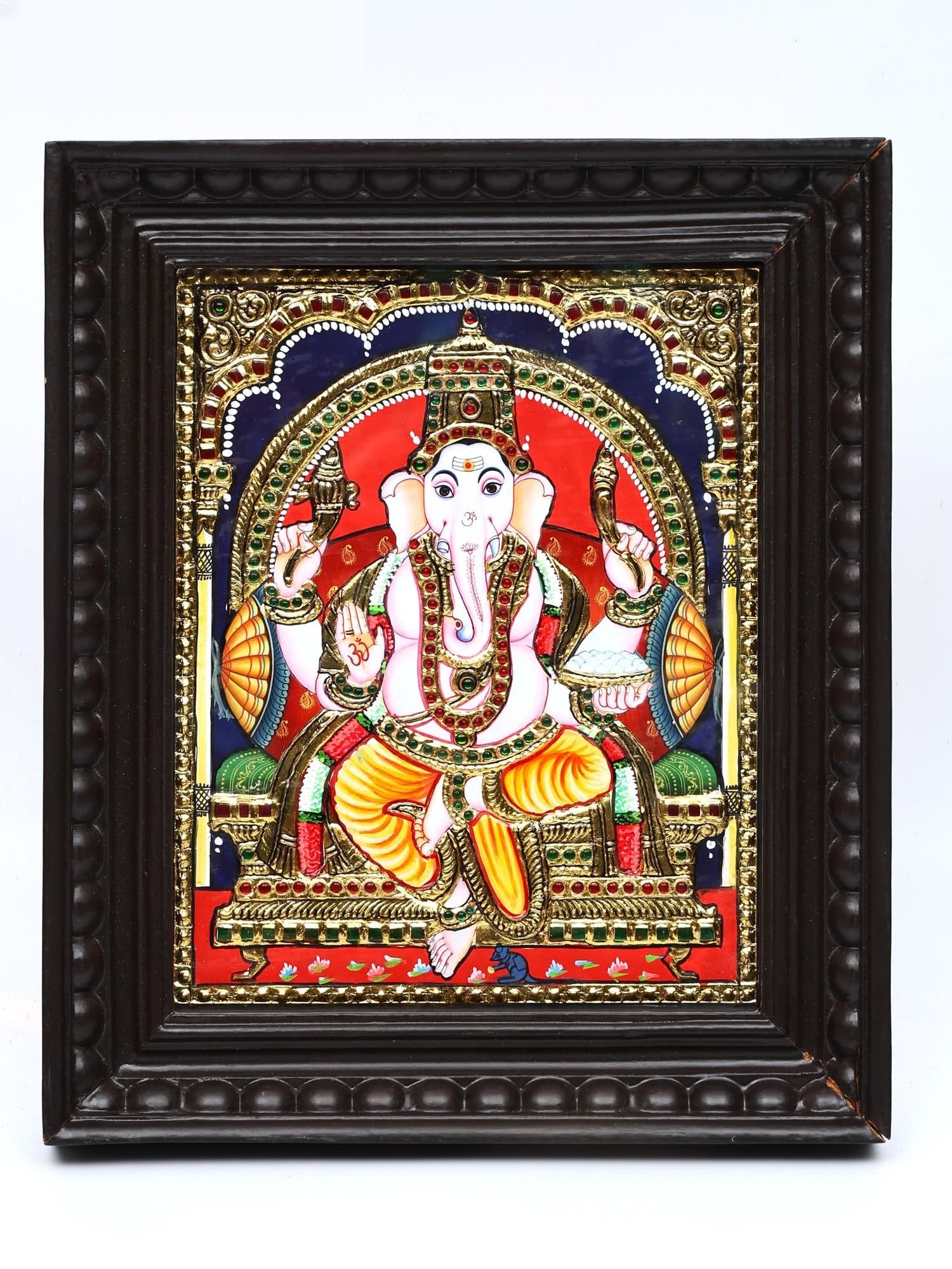 Lord Ganesha Seated on Throne | 24 Karat Gold Work | Framed Tanjore Painting: Title: Lord Ganesha Seated on Throne | 24 Karat Gold Work | Framed Tanjore Painting Description: Tanjore (Thanjavur) Painting Reserve: $233.00 Shipping: Domestic: Shipping rates are determined by dest