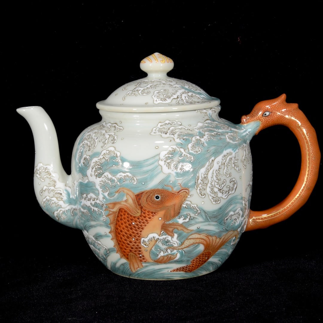 Porcelain Teapot Iron Red Glaze Dragon & Fish: Title: Porcelain Teapot Iron Red Glaze Dragon & Fish Origin: Chinese Date/Period: After1870 Materials: Porcelain Dimensions: 250x150(mm) 9.84x5.91(inches) Reserve: $1,199.00 Shipping: Domestic: