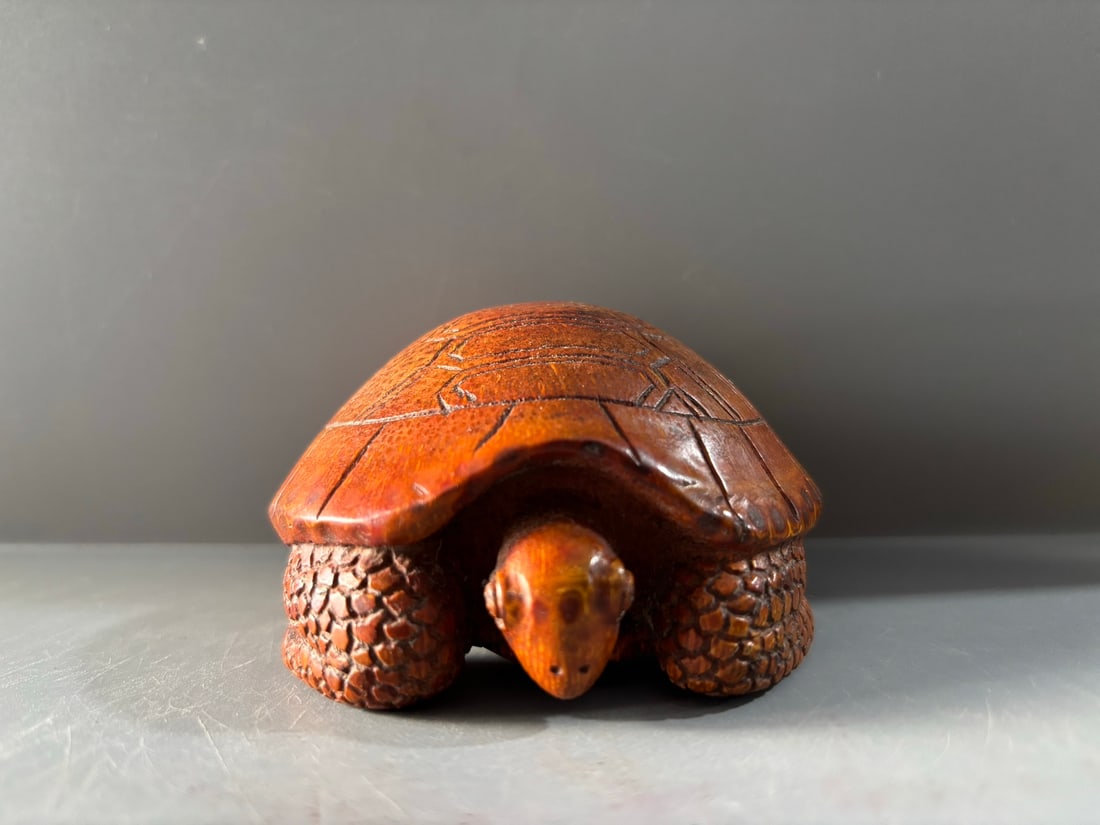 Vintage Hand Carved Bamboo Tortoise Statue: Title: Vintage Hand Carved Bamboo Tortoise Statue Origin: Chinese Date/Period: After1910 Materials: Bamboo Dimensions: 80x50(mm) 3.15x1.97(inches) Reserve: $280.00 Shipping: Domestic: Shipping rates