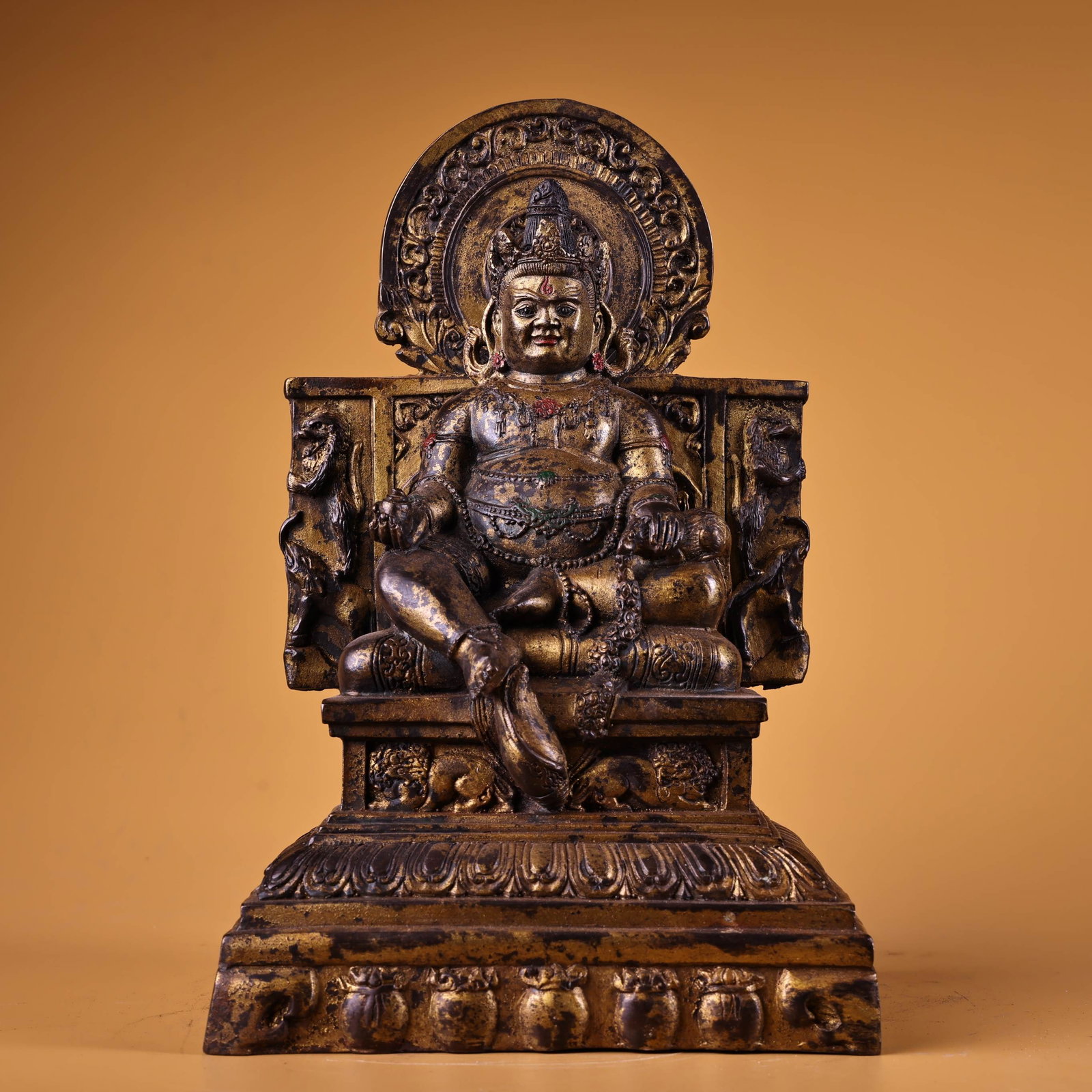 Gilt Gold Bronze Yellow Jambhala Statue: Title: Gilt Gold Bronze Yellow Jambhala Statue Origin: Chinese Date/Period: After1900 Materials: Gilt Gold Bronze Dimensions: 250x170(mm) 9.84x6.69(inches) Weight 6.83 lbs/3100g Reserve: $999.00