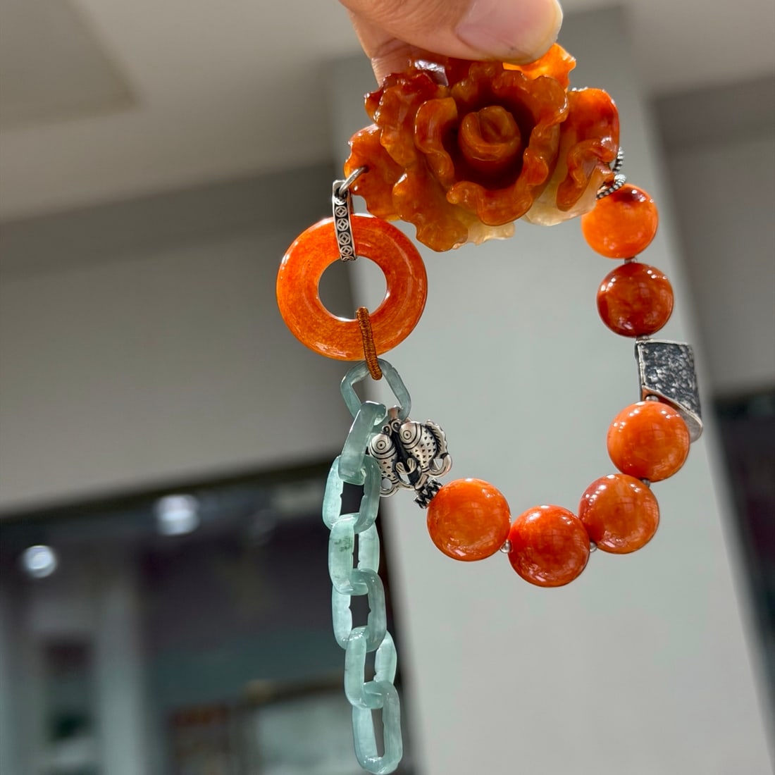 Red Jadeite Hand Carved Flower & Silver Bracelet: Title: Red Jadeite Hand Carved Flower & Silver Bracelet Origin: Chinese Date/Period: After2026 Materials: Red Jadeite,Silver Dimensions: Reserve: $389.00 Shipping: Domestic: Shipping rates are