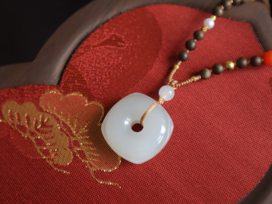 Natural Hetian Jade Lucky Pendant: Title: Natural Hetian Jade Lucky Pendant Origin: Chinese Date/Period: After2026 Materials: Hetian Jade Dimensions: 25x10.6(mm) 0.98x0.42(inches) Reserve: $220.00 Shipping: Domestic: Shipping rates