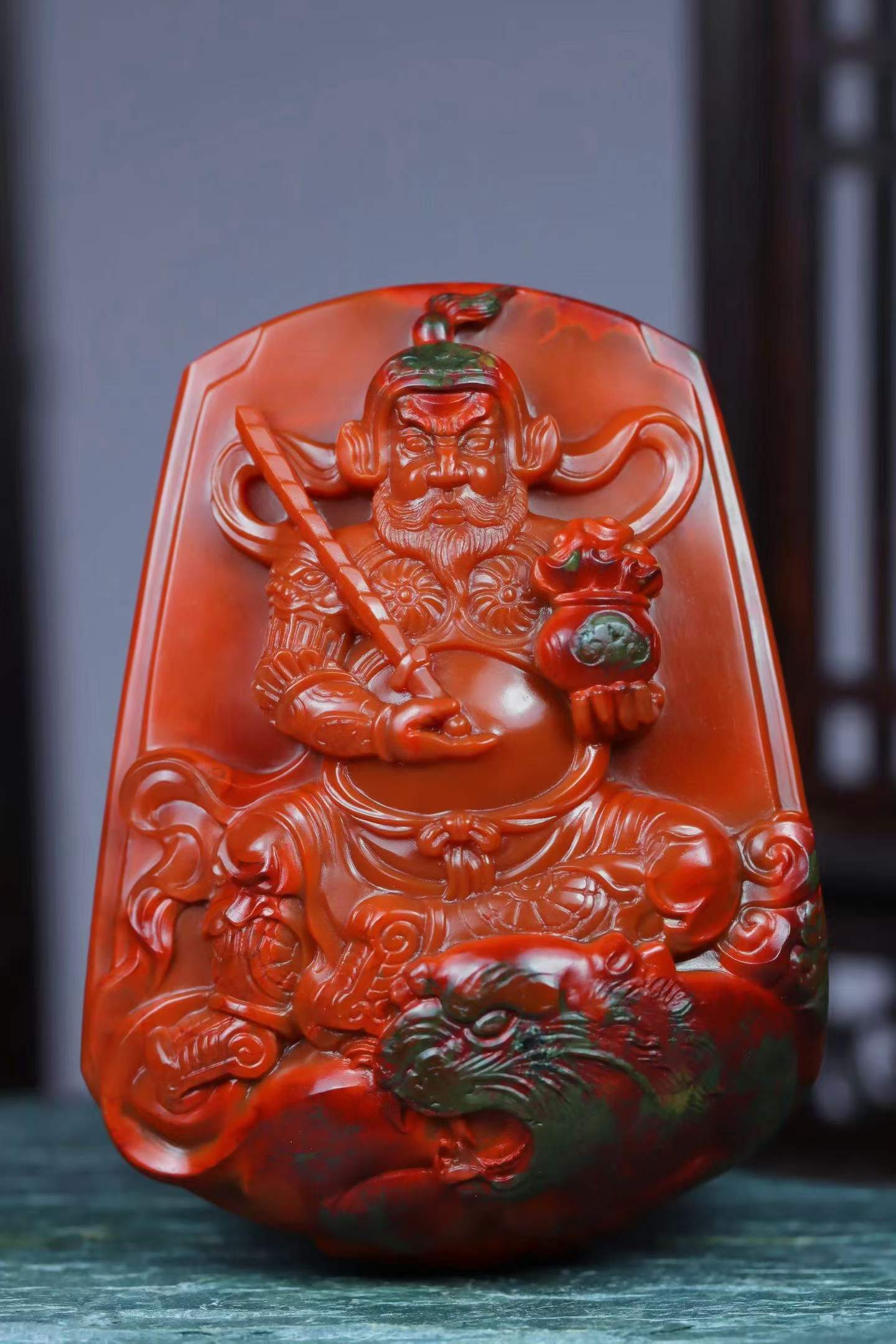 Nanhong Agate Hand Carved Guangong Pendant with Certificate: Title: Nanhong Agate Hand Carved Guangong Pendant with Certificate Origin: Chinese Date/Period: After2026 Materials: Nanhong Agate Dimensions: 59.6x44.6x22.3(mm) 2.35x1.76x0.88(inches) Weight 0.17