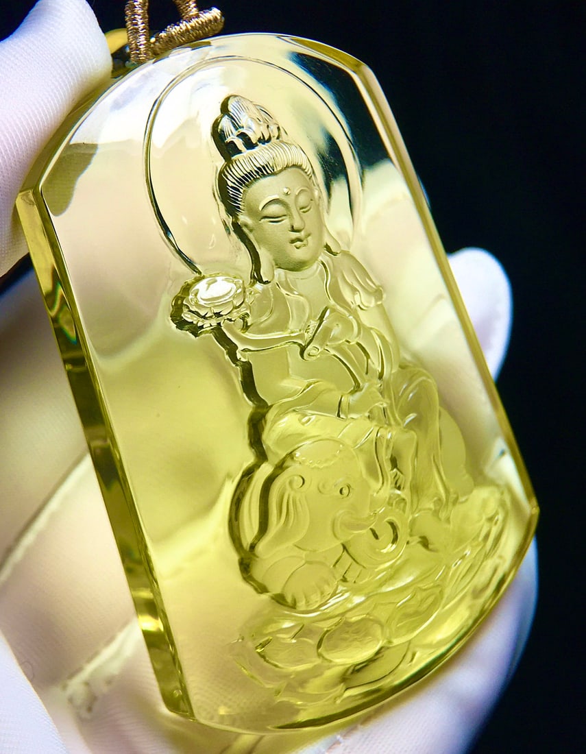 Yellow Crystal Hand Carved Samantabhadra & Elephant Pendant: Title: Yellow Crystal Hand Carved Samantabhadra & Elephant Pendant Origin: Chinese Date/Period: After2020 Materials: Crystal Dimensions: 62.8x44.5x14.5(mm) 2.47x1.75x0.57(inches) Weight 0.15
