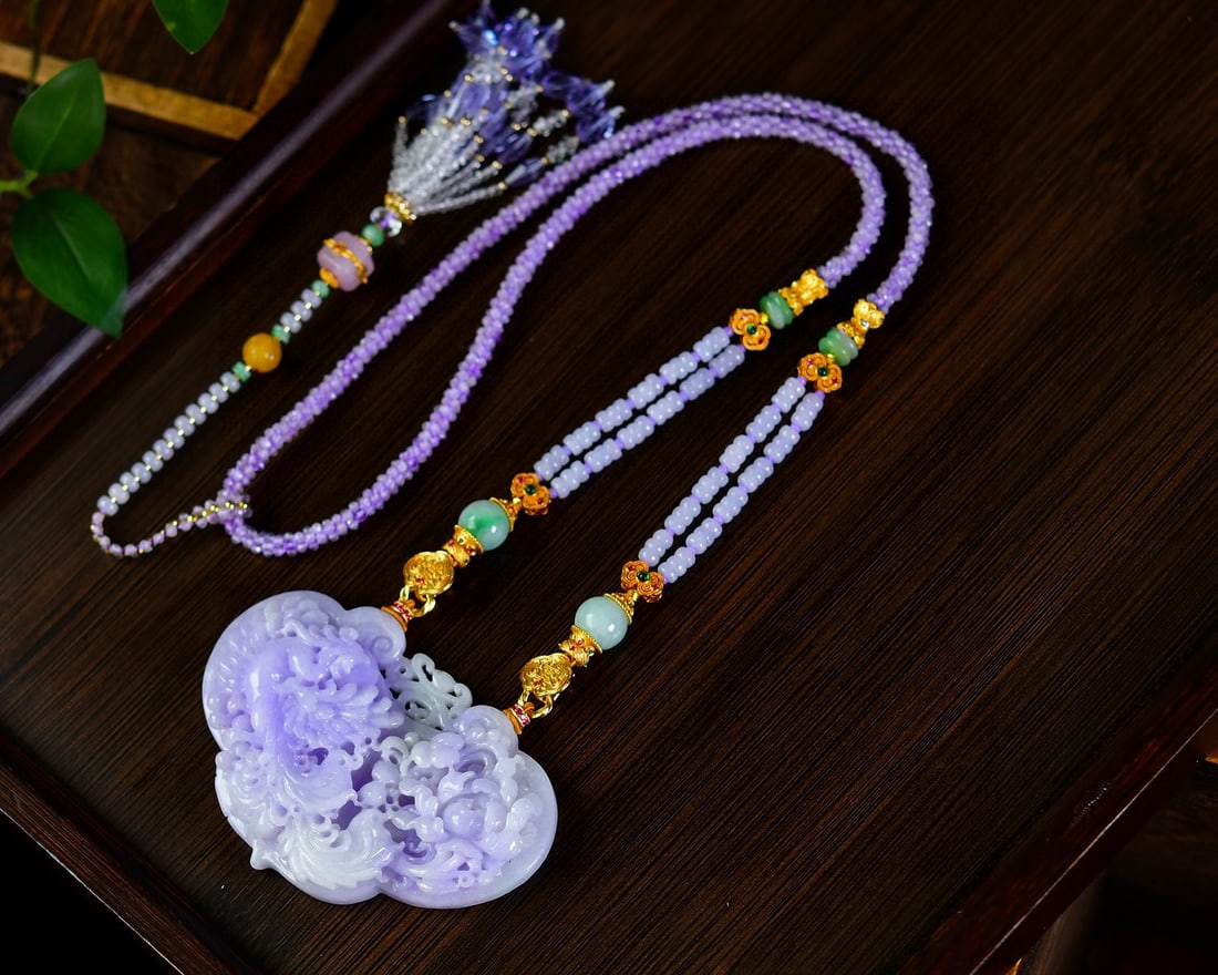 Purple Jadeite Hand Carved Phoenix Peony Pendant with Certificate: Title: Purple Jadeite Hand Carved Phoenix Peony Pendant with Certificate Origin: Chinese Date/Period: After2026 Materials: Jadeite Dimensions: 76x51x12(mm) 2.99x2.01x0.47(inches) Reserve: $1,499.00 Sh